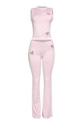 • Light pink heart cutout tank top with high waist flared pants