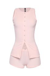Blush pink ribbed lounge set with fitted tank top and high-waisted shorts