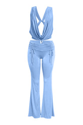 Soft blue two-piece set with open back cowl neck top and flare pants