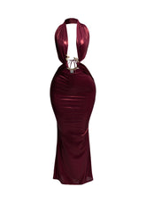 Front view of burgundy snake-trimmed halter maxi dress with plunging neckline and ruched fabric.