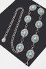 Silver western chain belt styled on mannequin with turquoise stone medallions

