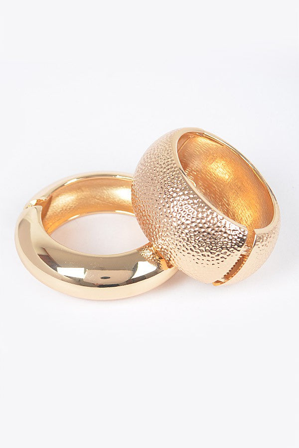 Gold polished bangle bracelet with high-gloss mirrored surface

