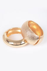 Gold polished bangle bracelet with high-gloss mirrored surface

