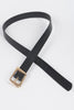 Sleek black waist belt with polished gold hardware and classic holes

