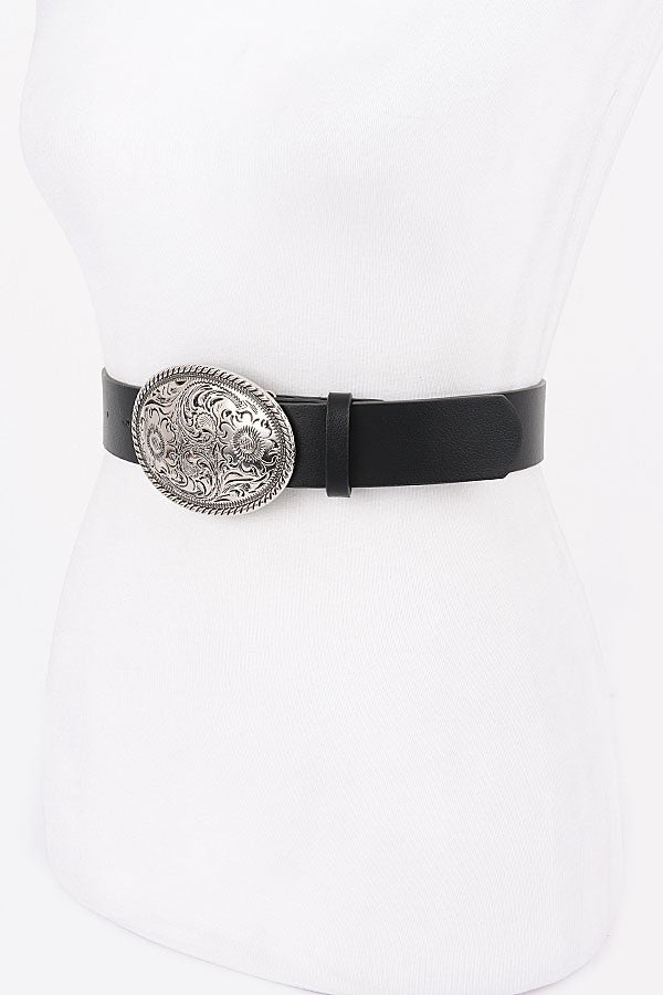 Cowgirl aesthetic belt with bold silver statement hardware

