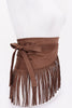 Brown faux suede fringe belt styled wrapped around waist

