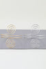 Polished silver cuff bracelet with geometric spiral wire design

