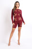 Die cut detailed long sleeve open back romper