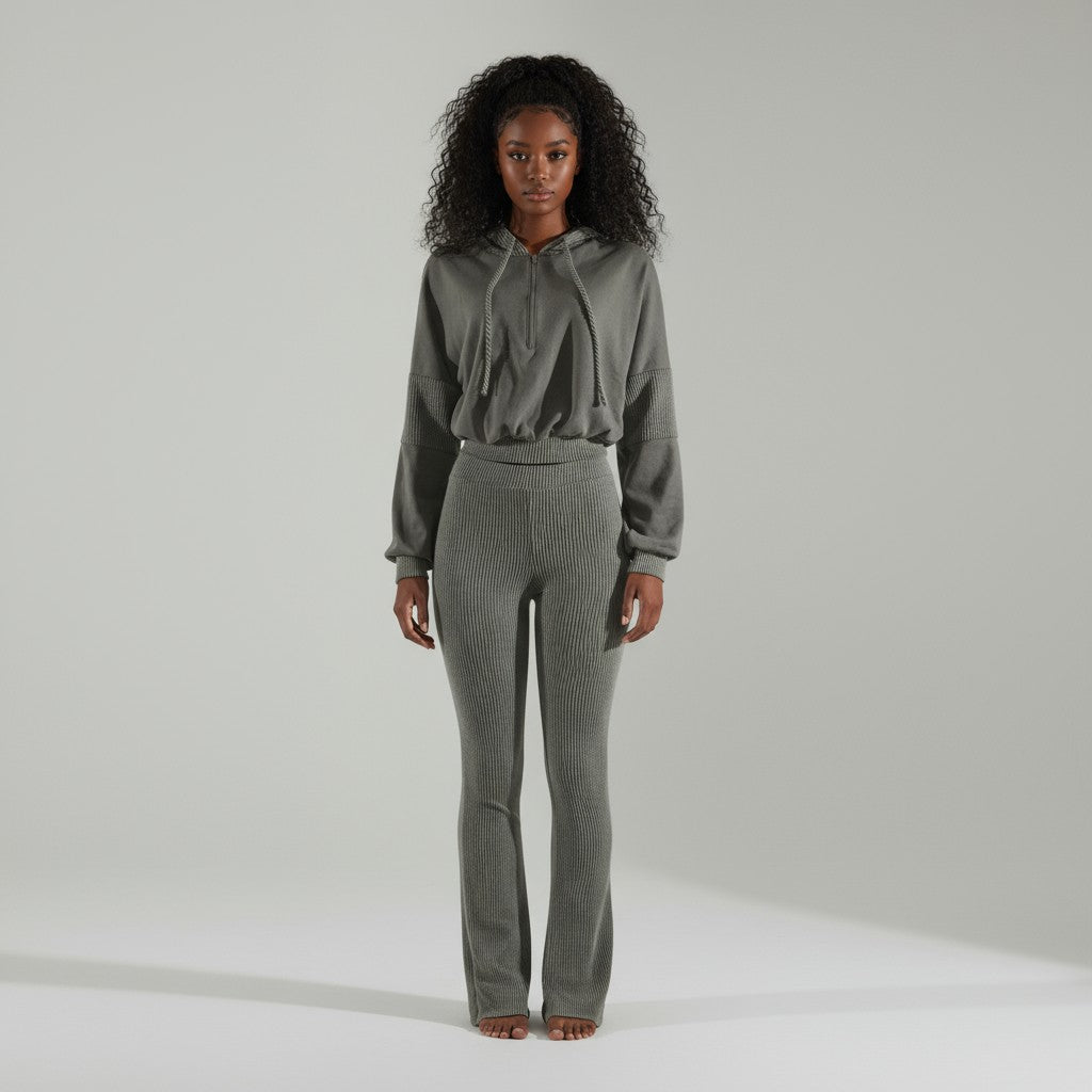 Front view of olive green ribbed two-piece set with cropped hoodie and high waist flare pants
