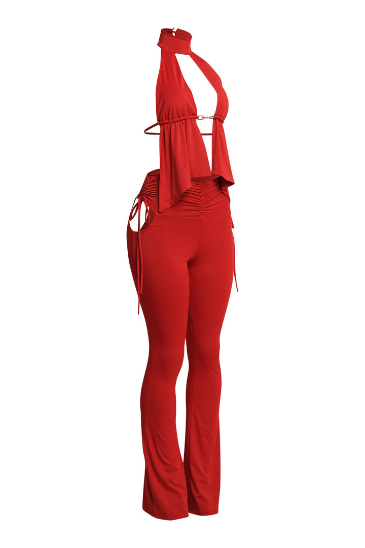 Bold red two-piece set with plunging neckline and full-length flares

