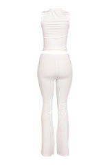 Neutral cream flared pant set with mockneck crop top