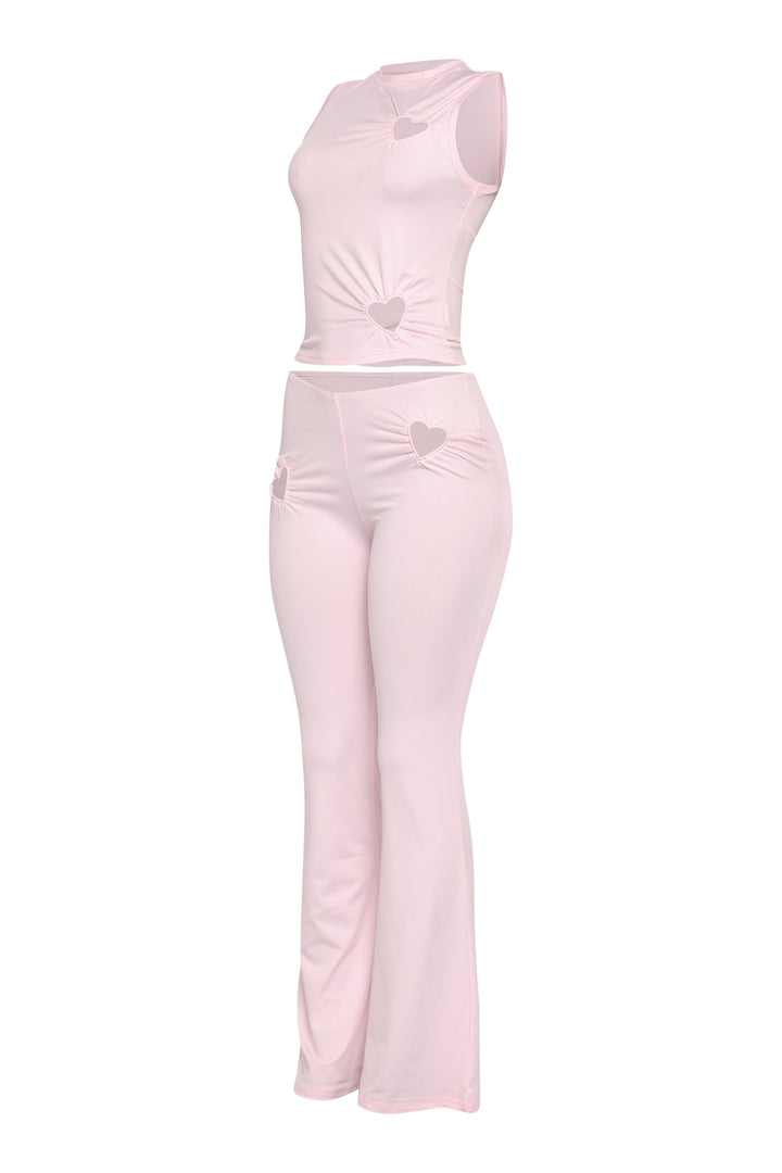 Stretchy blush pink flared pants outfit with heart tank