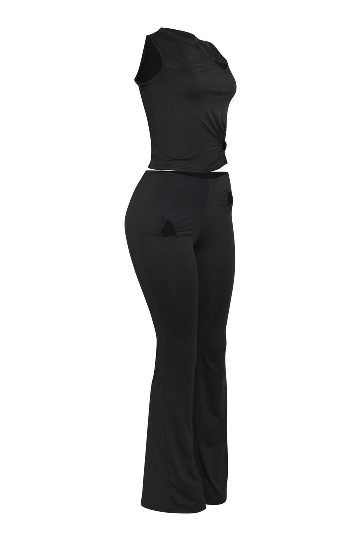 Sleek black two piece with mockneck top and wide leg pants