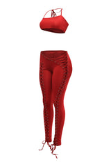 Sultry red lace up pant set with body-hugging silhouette
