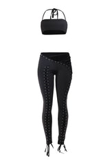Black lace up pant set with halter crop top and slim ankle pants