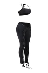 Sleek black two piece with lace up detail and curve-hugging fit