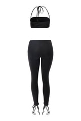 Black halter crop and lace up pants outfit for nightlife styling