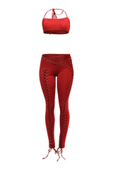 Red lace up pant set with halter crop top and slim fit ankle pants