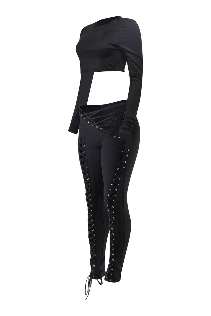 Black slim-fit pants with roundneck top