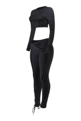 Black slim-fit pants with roundneck top