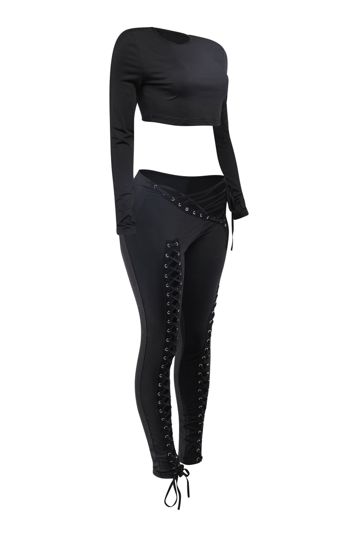 Black two-piece outfit with lace-up detail