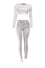 Ivory lace-up pants and crop top set