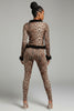 Back view of leopard lounge set with slim fit leggings and feather-detailed hem and cuffs