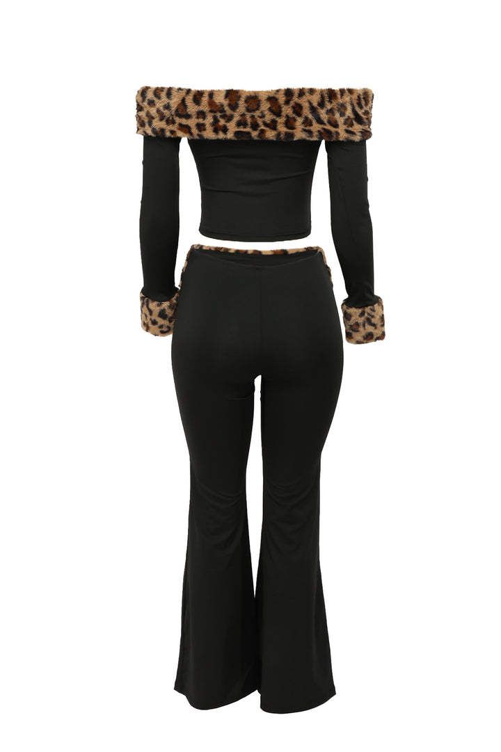 Black outfit with leopard print details on a white background