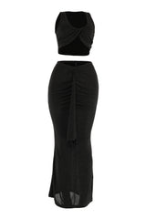 Front view of black two-piece set with twist detail and pull-on fit