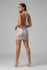 Snakeprint open back mini dress back view with tie-neck halter and figure-hugging silhouette