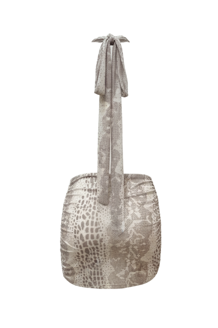 Snakeprint open back mini dress back view with tie-neck halter and figure-hugging silhouette