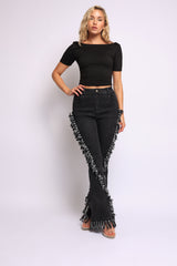 Distressed fringe denim flared pant