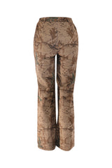 Back view of brown and green camo high waisted pants with soft drape and natural shape