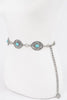 Western boho belt with turquoise accents and vintage-inspired sunburst design


