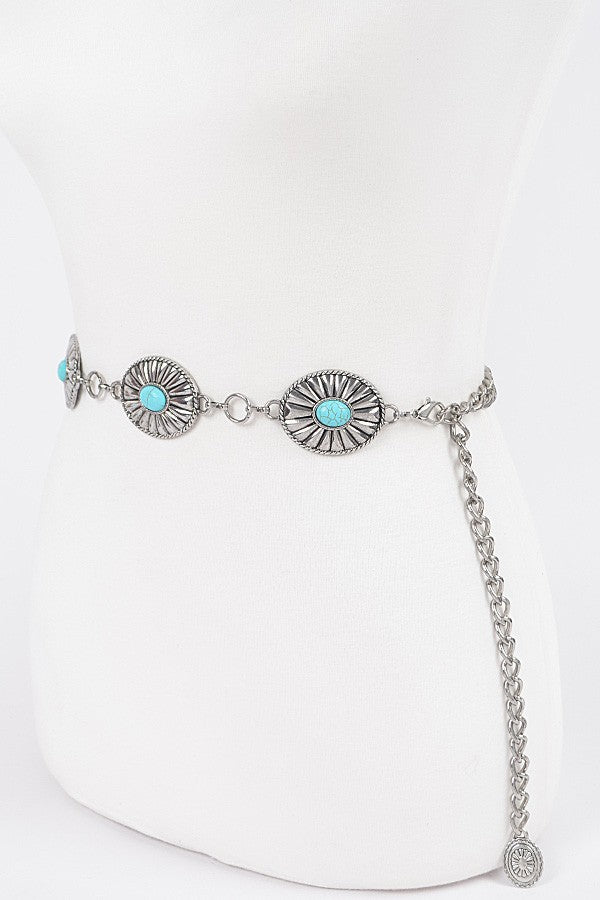 Western boho belt with turquoise accents and vintage-inspired sunburst design

