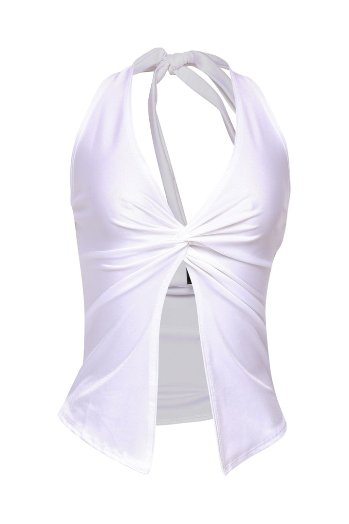 White halter top with front knot detail and split hem, styled for summer nights