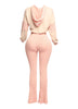 Trendy ribbed lounge set in pastel peach, with a relaxed-fit cropped hoodie and figure-flattering high-waisted pants. Perfect for stylish everyday wear or cozy nights in.