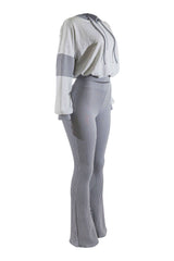Gray ribbed sweater and pants set on a white background