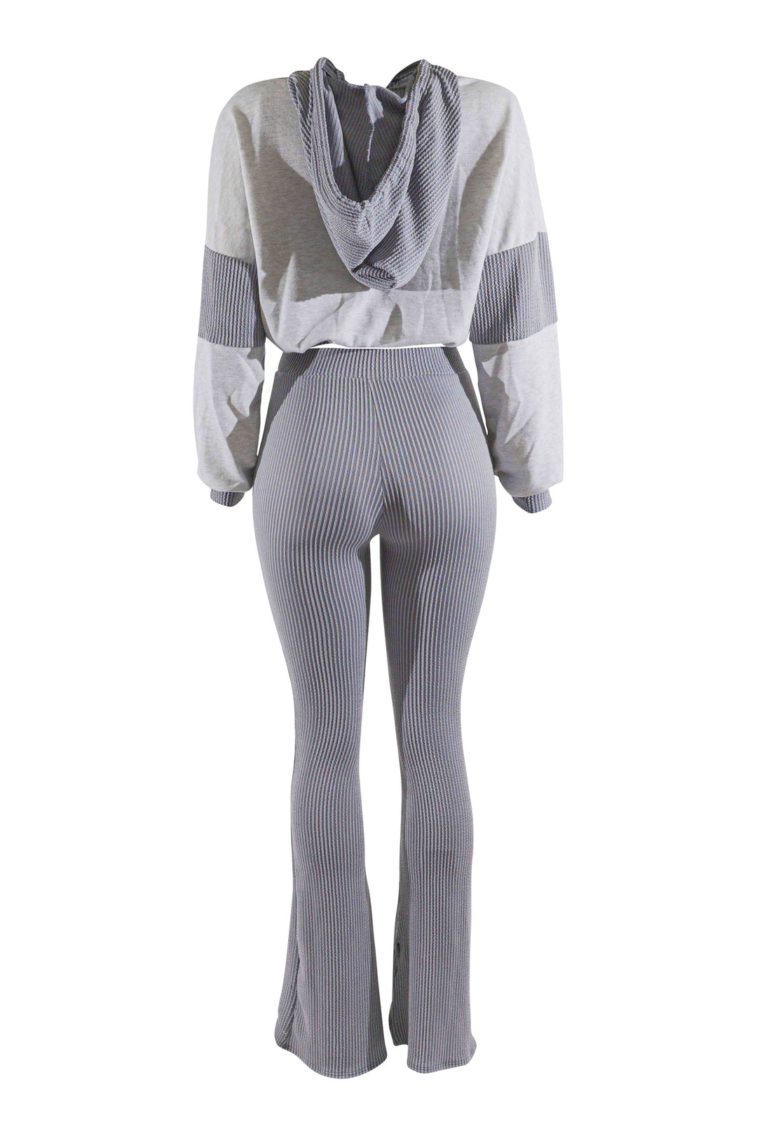Gray and white outfit with a cropped top and flared pants on a white background