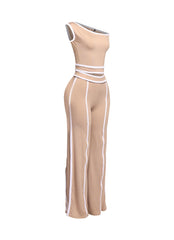 Trendy beige and white color-block two-piece set with off-shoulder top and flowing wide-leg pants, perfect for day-to-night outfits.