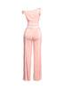 Blush pink and white two-piece pant set featuring an off-shoulder top and wide-leg pants for a stylish yet elegant vibe.