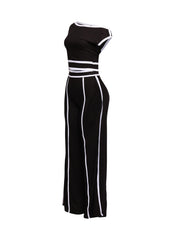 Trendy off-shoulder two-piece pant set with contrast paneling, ideal for night outs or fashion-forward events.