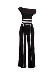 Bold color-contrast off-shoulder pant set with striking white trim, perfect for edgy and statement-worthy looks.