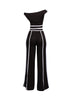 Chic and modern black-and-white off-shoulder pant set, featuring wide-leg pants for a sleek, high-fashion vibe.