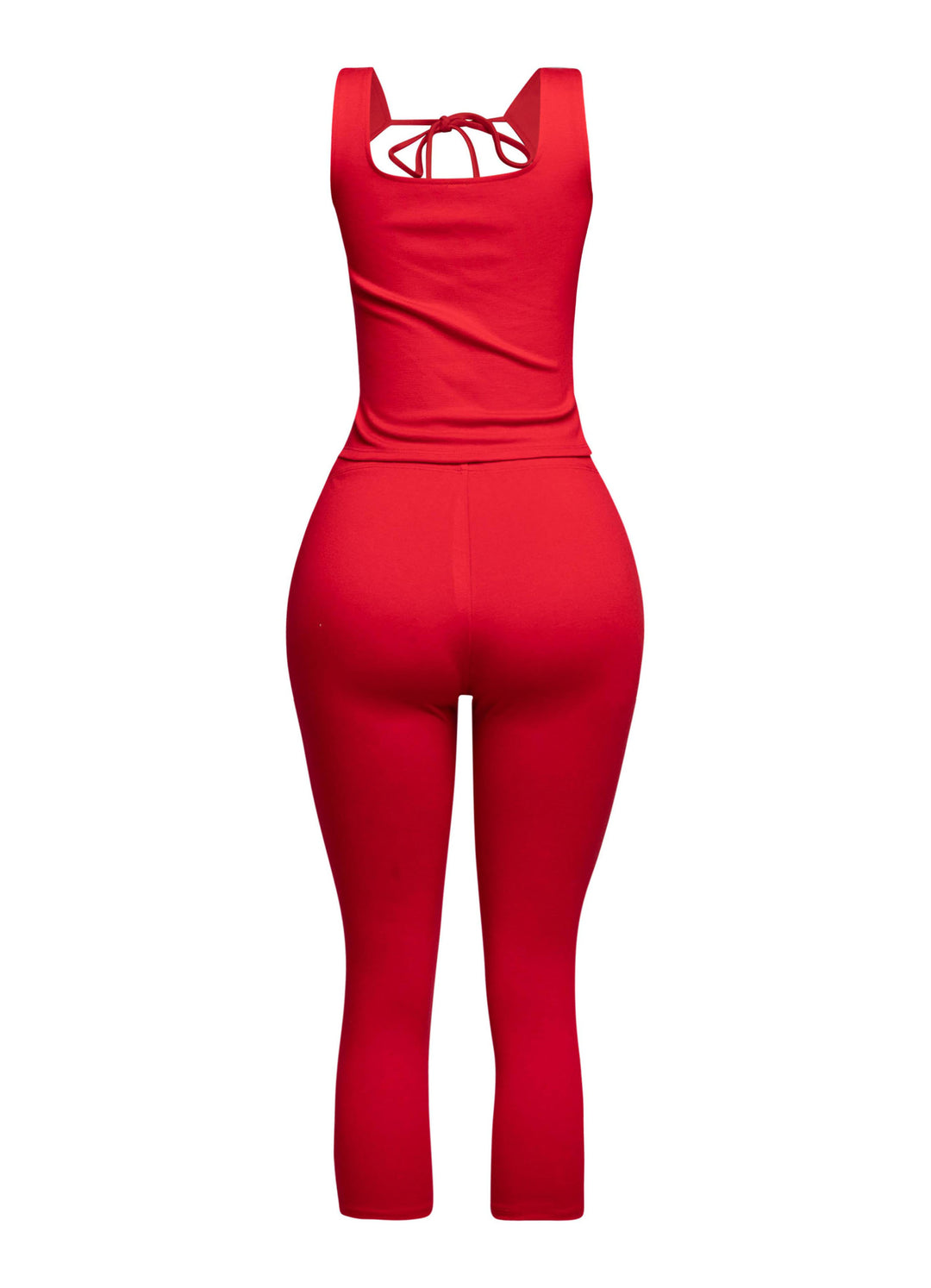 Trendy red two-piece outfit featuring a tie-front tank top and flattering capri pants, ideal for day-to-night transitions.