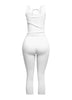 Trendy white tie-front crop tank and capri pant set, delivering a fresh and versatile ensemble for day-to-night wear.