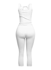 Trendy white tie-front crop tank and capri pant set, delivering a fresh and versatile ensemble for day-to-night wear.