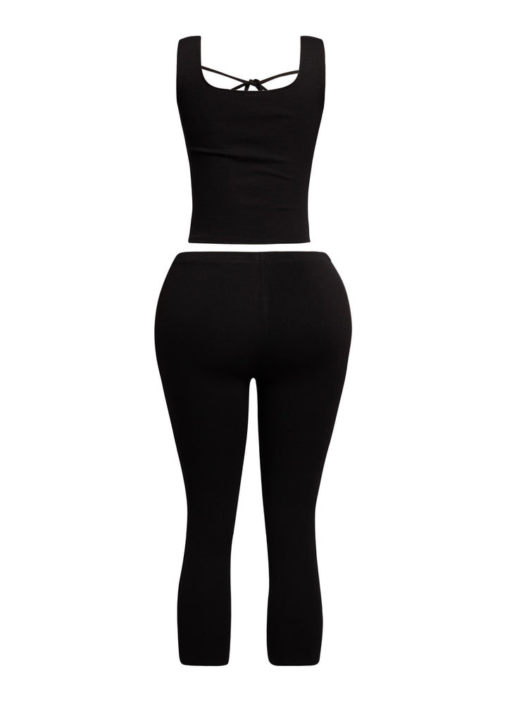 Trendy black tie-front tank top and capri pant set, designed for stylish and effortless day-to-night transitions.