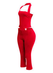 Eye-catching red halter top and fitted capri pant set, ideal for chic, standout outfits that turn heads.