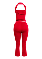 Fiery red halter neck top with matching capri pants, delivering a sleek and daring silhouette for fashion-forward events and valentine